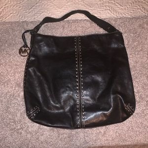 MK black studded satchel